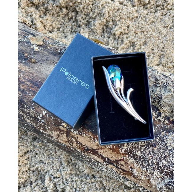 Silver flower brooch with crystal