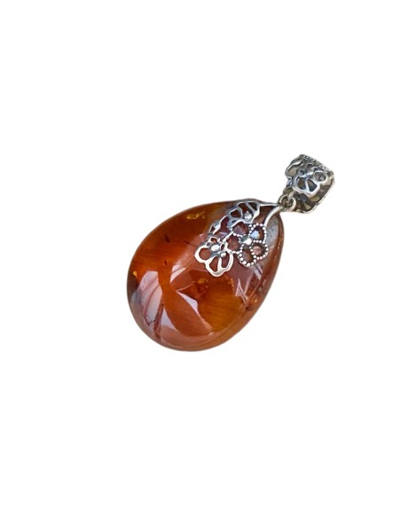 unique amber pendant with silver flowers
