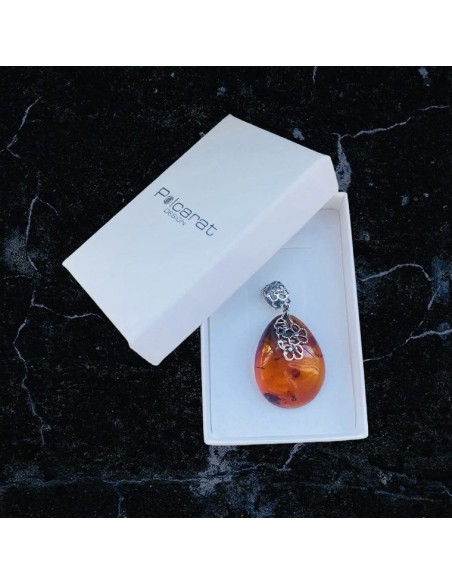 Unique amber pendant wrapped in silver flowers BW 112