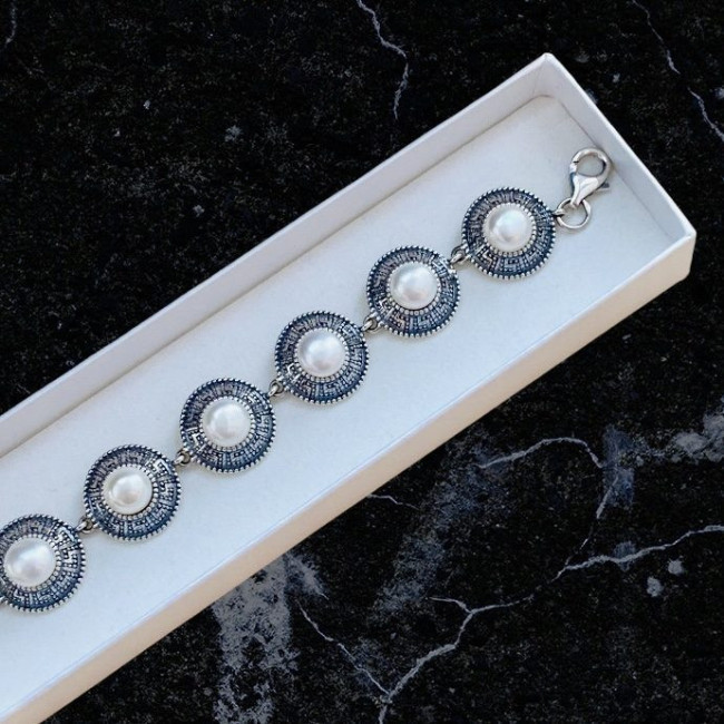 Silver bracelet with pearls L 1724