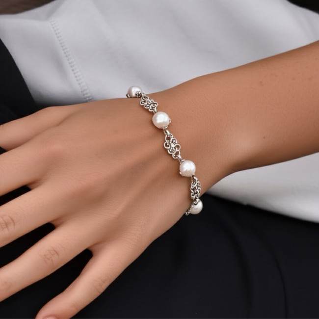 Silver oxidized bracelet with pearls L 1787