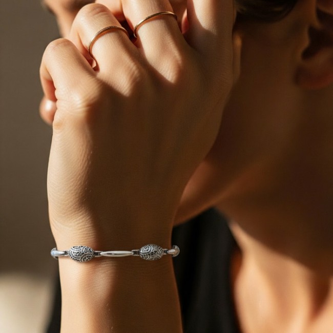 Silver daisy bracelet in oval L 1830