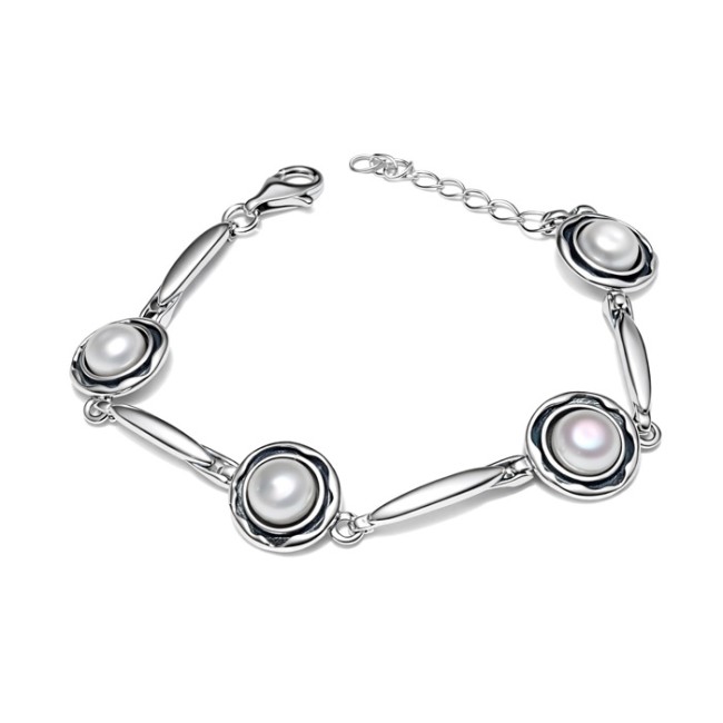 Silver bracelet with pearls L 1852 Polcarat Design