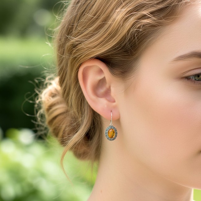 Sterling silver earrings with milky amber K 1740 | Polcarat Design