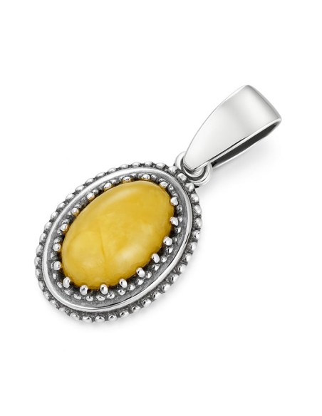 Srebrny wisiorek z mlecznym bursztynem bałtyckim 925 – oksydowany, elegancki W 2081