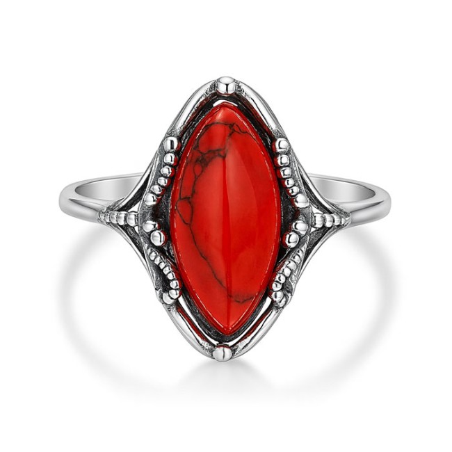Classic design of a ring with coral. Large selection of jewelry with natural stones only at Polcarat Design!