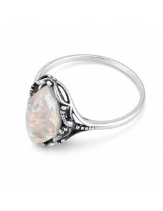 Classic design of a ring with coral. Large selection of jewelry with natural stones only at Polcarat Design!