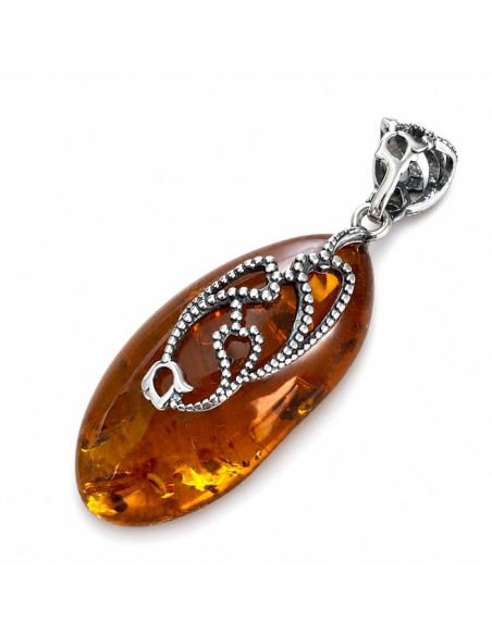 A unique amber pendant wrapped in silver pattern BW 110